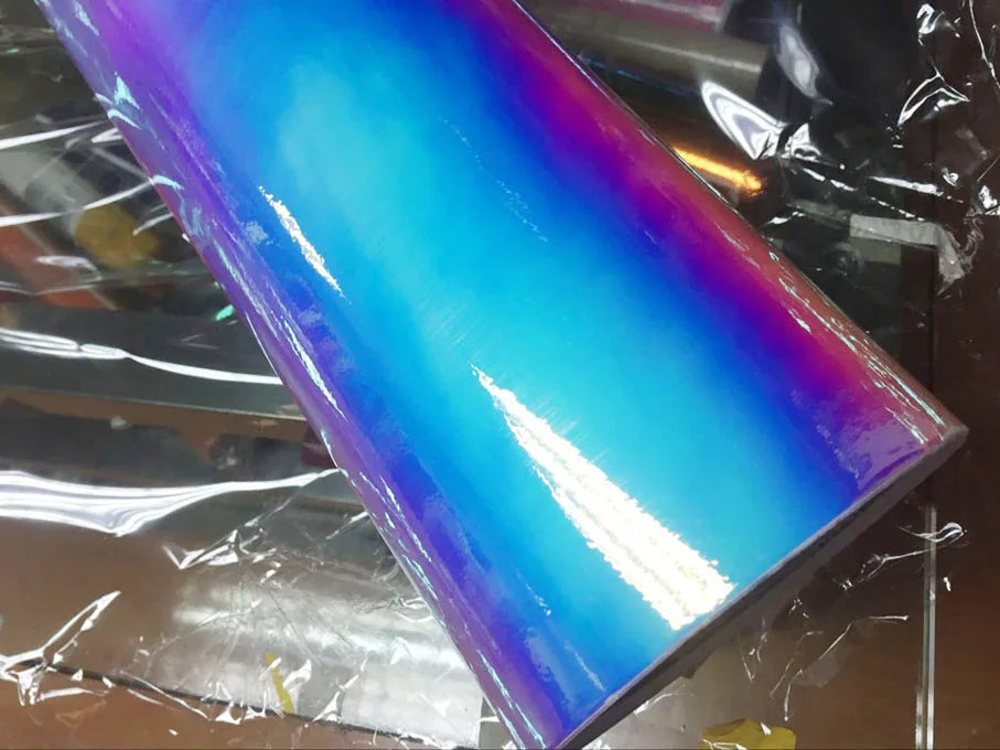 Color-shifting purple vinyl wrap with iridescent rainbow effect
