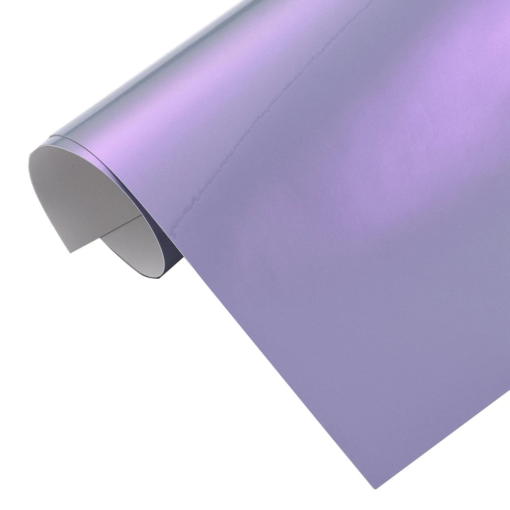 Color-changing vinyl wrap featuring grey base with red pearl highlights for ski gear