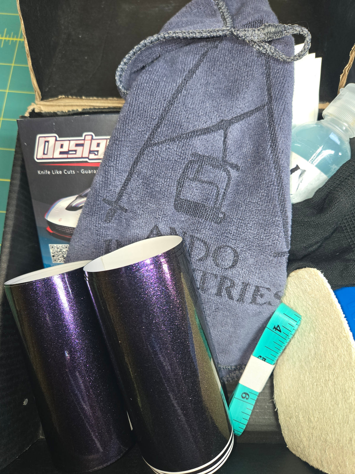 Custom ski pole wrap with glossy color-change copper and purple vinyl