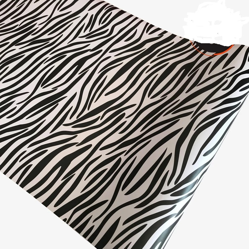 Custom ski pole wrap featuring classic zebra stripe design