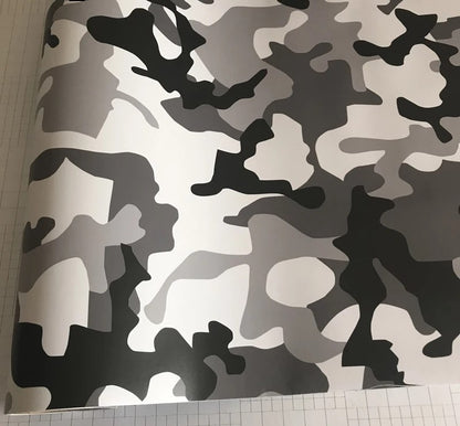 Custom ski pole wrap featuring modern black and white camouflage design