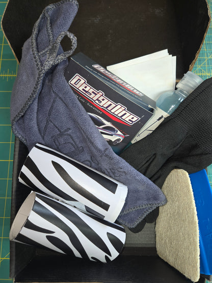 Durable vinyl wrap with black and white zebra pattern for ski gear personalization